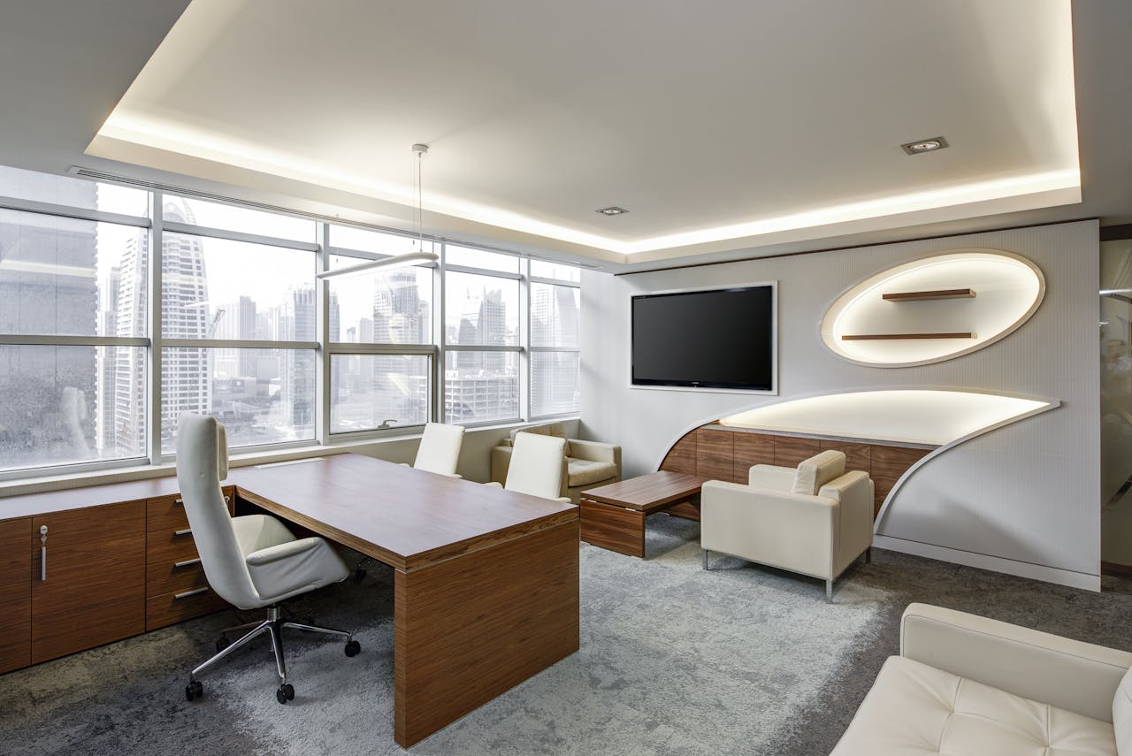 gallery-01 Sleek office space featuring contemporary furniture and city skyline views, ideal for professionals.